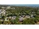 Expansive aerial view showcases the property's location, nestled amongst the trees near the ocean at 245 Egret Run Ln. # 1023, Pawleys Island, SC 29585