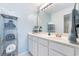 Clean and organized bathroom with a white vanity, large mirror, and neatly arranged towels at 245 Egret Run Ln. # 1023, Pawleys Island, SC 29585