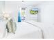 Bedroom with queen bed and balcony access at 245 Egret Run Ln. # 1023, Pawleys Island, SC 29585