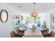 Open-concept dining area with contemporary lighting and decor at 245 Egret Run Ln. # 1023, Pawleys Island, SC 29585
