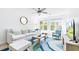 Cozy living room with ceiling fan and views of the outdoors at 245 Egret Run Ln. # 1023, Pawleys Island, SC 29585