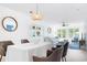 Bright living room/dining area with modern decor and ample natural light at 245 Egret Run Ln. # 1023, Pawleys Island, SC 29585