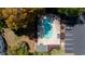 Aerial view of the community pool, surrounded by lush landscaping and ample parking at 245 Egret Run Ln. # 1023, Pawleys Island, SC 29585
