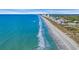 Stunning aerial shot capturing the serene beach, shoreline, and charming coastal town with gorgeous water at 2711 Ocean Blvd. S # 915, North Myrtle Beach, SC 29582