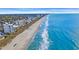 Breathtaking aerial view of the beach and coastline, showing oceanfront condos along the sandy shore at 2711 Ocean Blvd. S # 915, North Myrtle Beach, SC 29582