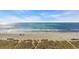 Aerial view of a sandy beach with people walking along the shoreline at 2711 Ocean Blvd. S # 915, North Myrtle Beach, SC 29582