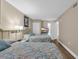 Comfortable bedroom featuring two beds with plush pillows and a serene, inviting atmosphere at 2711 Ocean Blvd. S # 915, North Myrtle Beach, SC 29582
