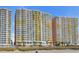 Beachfront condo building with multiple balconies and nearby beach access at 2711 Ocean Blvd. S # 915, North Myrtle Beach, SC 29582