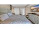 Comfortable main bedroom with large bed and neutral decor, ideal for a peaceful night's sleep at 2711 Ocean Blvd. S # 915, North Myrtle Beach, SC 29582