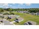 Aerial view of a residential neighborhood showcasing the community and surrounding green spaces at 3019 Woodbury Ct., Conway, SC 29527