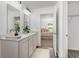 Bright bathroom with modern vanity and ensuite bedroom access at 3019 Woodbury Ct., Conway, SC 29527