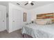 This bedroom features modern decor, soft carpeting, and ample closet space at 3019 Woodbury Ct., Conway, SC 29527