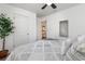 Cozy bedroom with soft carpet, ceiling fan, and adjacent hall and closet doors at 3019 Woodbury Ct., Conway, SC 29527