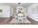 Bright dining room features a modern chandelier and stylish decor at 3019 Woodbury Ct., Conway, SC 29527