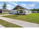 A well-maintained lawn and driveway complement this charming single-Gathering home, highlighting its curb appeal at 3019 Woodbury Ct., Conway, SC 29527