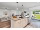 Kitchen island featuring granite countertops with outdoor views and stainless appliances at 3019 Woodbury Ct., Conway, SC 29527