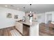 Kitchen island with granite countertops, modern appliances, and eat-in seating at 3019 Woodbury Ct., Conway, SC 29527
