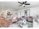 Open-concept living space with elegant furnishings, decorative artwork, and a bright, airy feel at 3019 Woodbury Ct., Conway, SC 29527