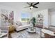 Bright living room featuring contemporary decor, plush seating, and natural light from a large window at 3019 Woodbury Ct., Conway, SC 29527