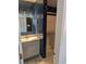 Traditional bathroom with tiled walls, vanity, and walk-in shower at 302 St. Andrews Ln., Myrtle Beach, SC 29588