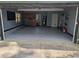 Spacious garage with ample storage, featuring a utility sink and well-lit space at 302 St. Andrews Ln., Myrtle Beach, SC 29588
