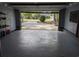 Bright garage leading to long drive way, offering ample space and natural light at 302 St. Andrews Ln., Myrtle Beach, SC 29588