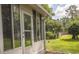 Screened porch overlooks backyard, providing a relaxing outdoor living space at 302 St. Andrews Ln., Myrtle Beach, SC 29588