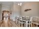 Formal dining room showcasing wood floors and decorative wall trim at 3034 Viceroy Loop, Little River, SC 29566