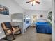 Cozy bedroom features a bunk bed, full bed, ceiling fan, and stylish nautical decor at 308 44Th Ave. N, North Myrtle Beach, SC 29582