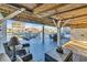 Relax on the covered deck, complete with a hammock, waterfront views, and comfortable seating at 308 44Th Ave. N, North Myrtle Beach, SC 29582