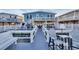 Inviting coastal home featuring a large deck, outdoor seating, and waterfront access at 308 44Th Ave. N, North Myrtle Beach, SC 29582