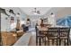 Bright living space with wood floors, ceiling fan, with open access to dining room and outdoor patio at 308 44Th Ave. N, North Myrtle Beach, SC 29582