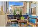Cozy outdoor living space on a covered porch, perfect for relaxation and enjoying the outdoors at 308 44Th Ave. N, North Myrtle Beach, SC 29582