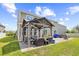 Outdoor living space featuring a covered patio with comfortable seating, ideal for relaxation at 3212 Saddlewood Circle, Myrtle Beach, SC 29579