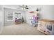 Large bonus room features shelving and storage for an organized and clutter-free space at 3212 Saddlewood Circle, Myrtle Beach, SC 29579