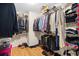 Walk-in closet with wood floor, extensive shelving and hanging rods for optimal storage space at 3212 Saddlewood Circle, Myrtle Beach, SC 29579