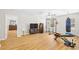 Workout room featuring a fan, tv, free weights, and heavy bag on a wood floor at 3212 Saddlewood Circle, Myrtle Beach, SC 29579