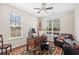 Home office featuring a wooden desk, comfortable chair, natural light, and hardwood flooring at 3212 Saddlewood Circle, Myrtle Beach, SC 29579