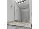 Bathroom vanity with granite counters, mirror and modern lighting at 3563 Chestnut Dr. # 3563, Myrtle Beach, SC 29577
