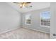 Bedroom features a ceiling fan, neutral paint, and plush carpeting at 3563 Chestnut Dr. # 3563, Myrtle Beach, SC 29577
