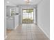 Bright dining area featuring tile floors and sliding glass door to patio at 3563 Chestnut Dr. # 3563, Myrtle Beach, SC 29577