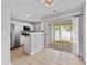 Bright dining area with stainless appliances and a sliding glass door to patio at 3563 Chestnut Dr. # 3563, Myrtle Beach, SC 29577
