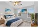 Comfortable main bedroom showcasing coastal decor, ceiling fan, and cozy lamps at 3563 Chestnut Dr. # 3563, Myrtle Beach, SC 29577