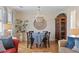 Charming dining area featuring a chandelier, decorative wall art, and a wooden cabinet at 3731 Spruce Dr., Myrtle Beach, SC 29577