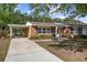 Attractive single-story brick home with carport and manicured bushes at 3731 Spruce Dr., Myrtle Beach, SC 29577