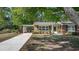 Charming single-story brick home with a covered carport and well-maintained landscaping at 3731 Spruce Dr., Myrtle Beach, SC 29577