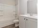 Bright bathroom features a tub-shower combination with white cabinets and modern fixtures at 376 Black Pearl Way, Myrtle Beach, SC 29588