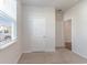 Cozy bedroom with neutral carpet, a window, and white walls at 376 Black Pearl Way, Myrtle Beach, SC 29588