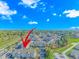 Aerial shot shows the condo building is near many businesses and the ocean at 3795 Hitchcock Way # 617, Myrtle Beach, SC 29577