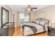 Comfortable main bedroom with a ceiling fan, a large window, and ample natural light at 3795 Hitchcock Way # 617, Myrtle Beach, SC 29577
